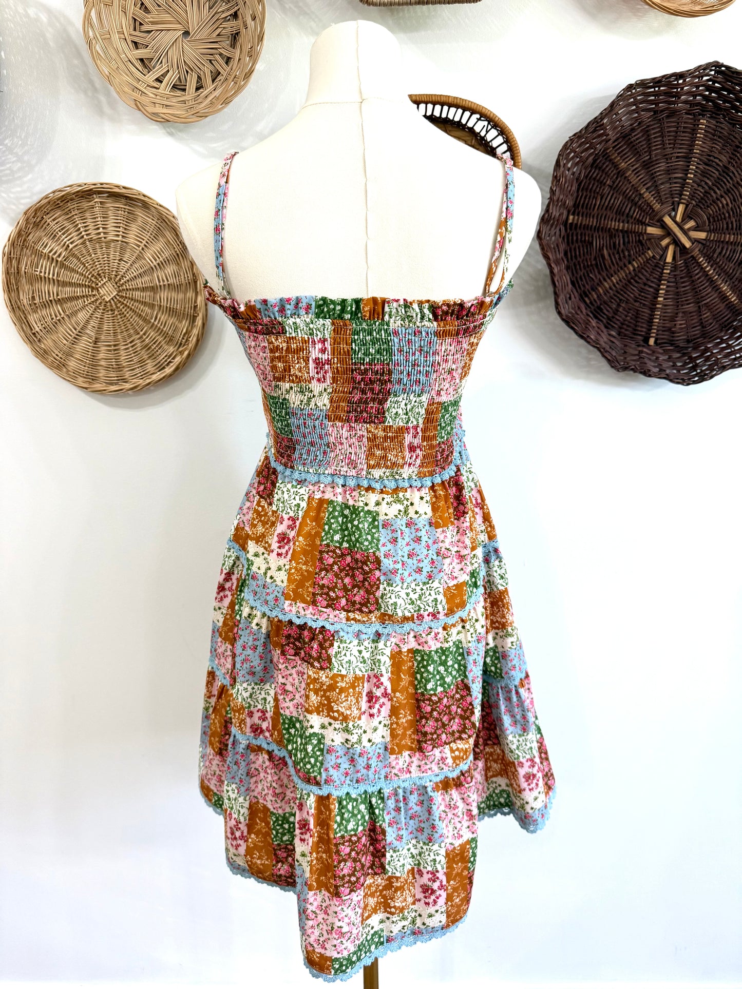 The Ramsey Quilt Patchwork Print Dress with Ric Rac Bow Detail