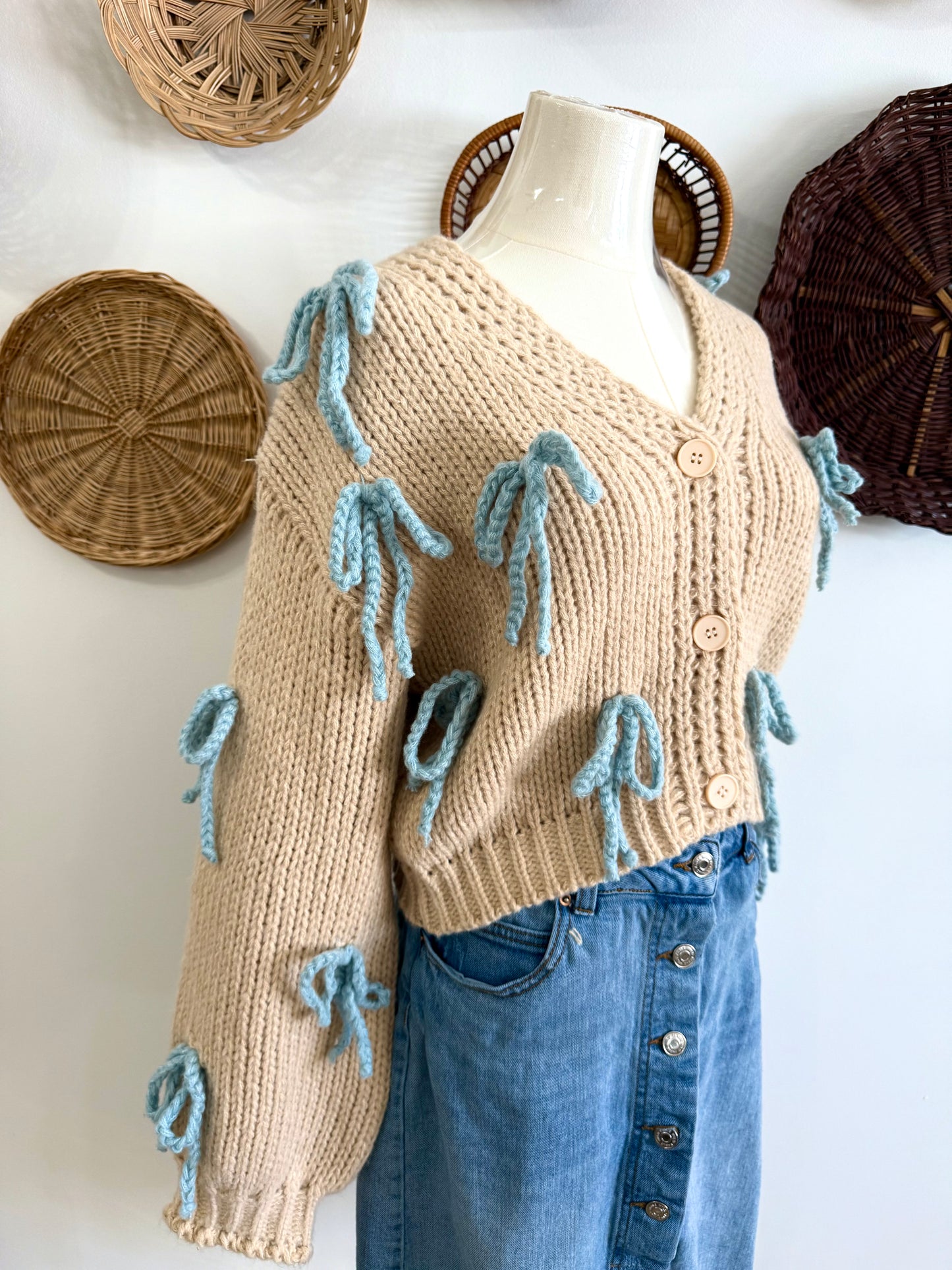 The Covey Blue Bow Cardigan in Ecru