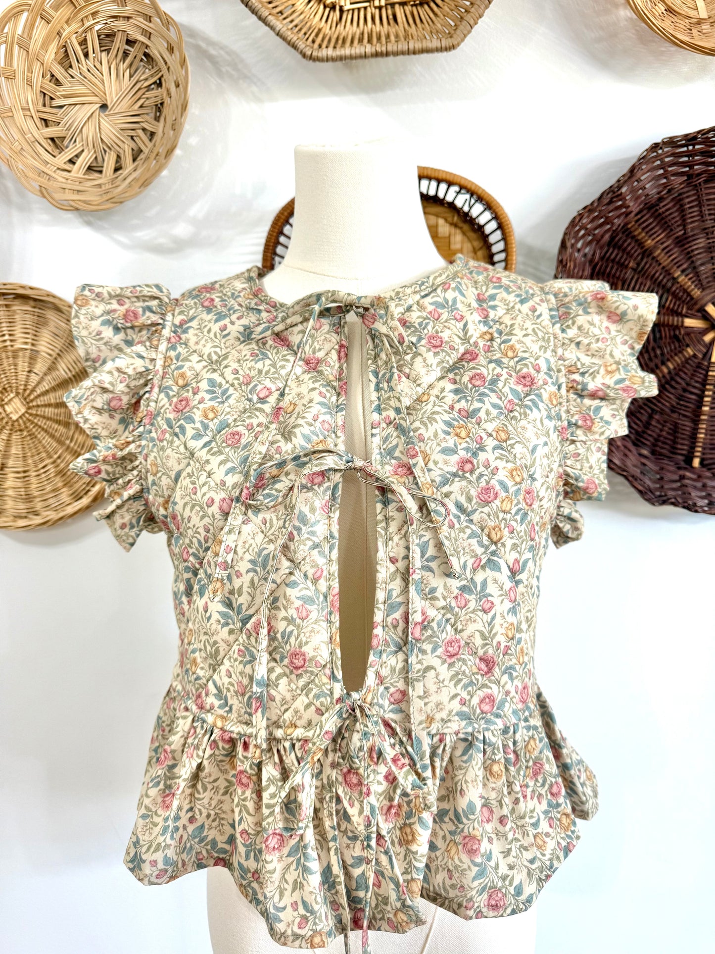 The Adora Quilted Floral Print Vest in Beige