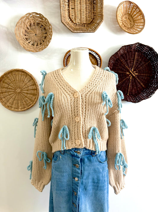 The Covey Blue Bow Cardigan in Ecru
