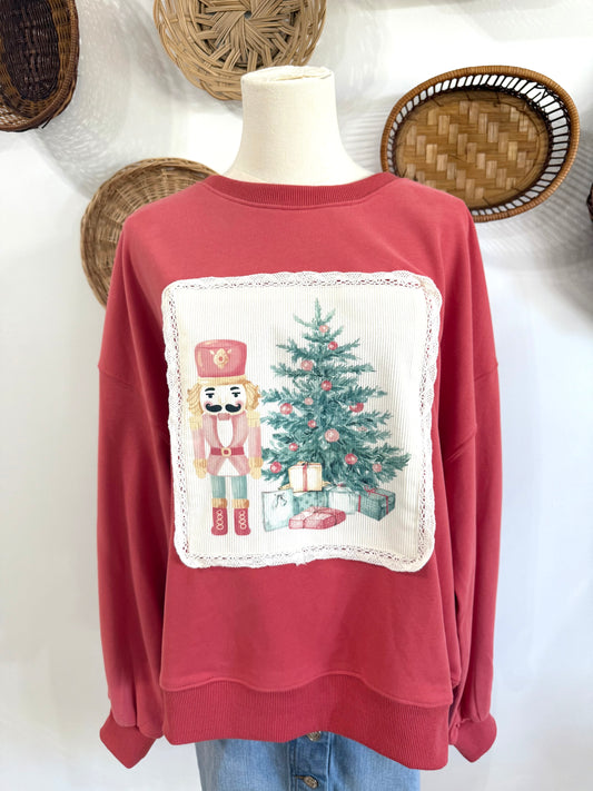The Jingle Nutcracker Appliqué Sweatshirt in Dusty Red