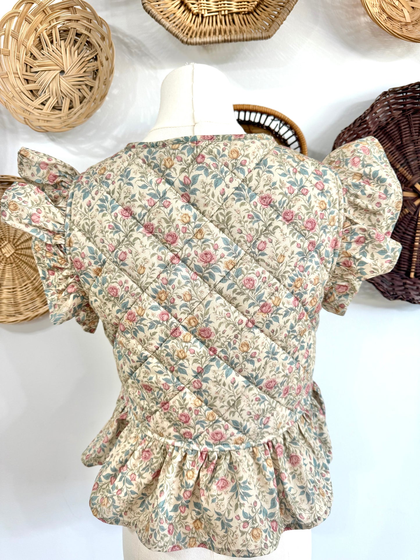 The Adora Quilted Floral Print Vest in Beige