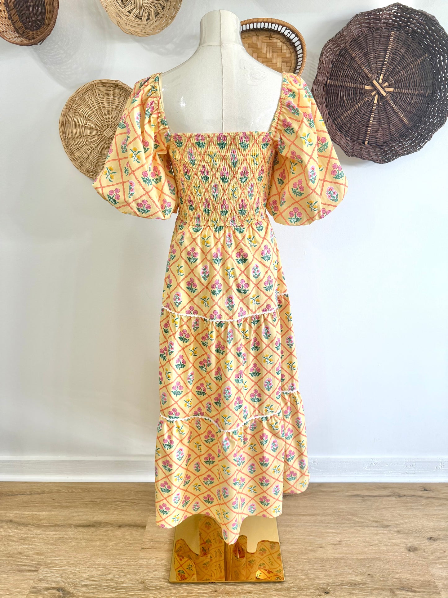 The Everlynn Puff Sleeve Bow Detail Floral Maxi Dress in Yellow