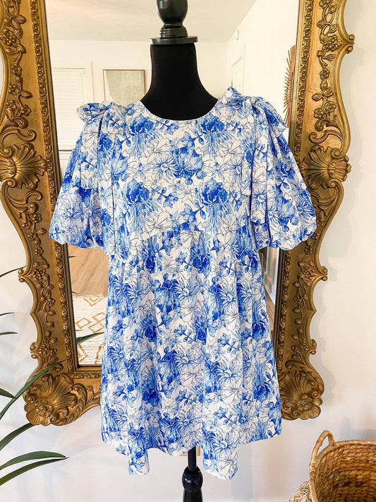 The Brixton White & Blue Floral Dress w/ Bow Detail