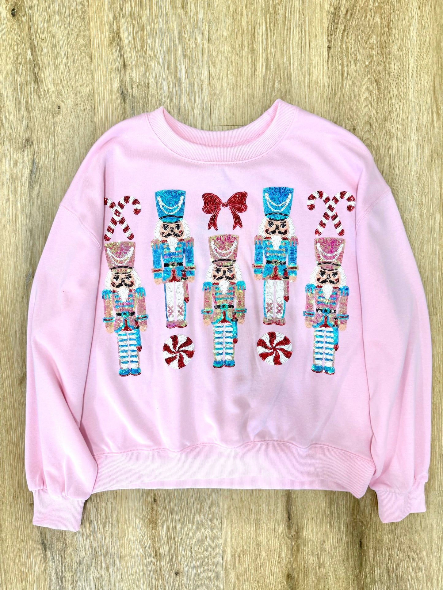 The Lucy Sequin Nutcracker Sweatshirt in Light Pink