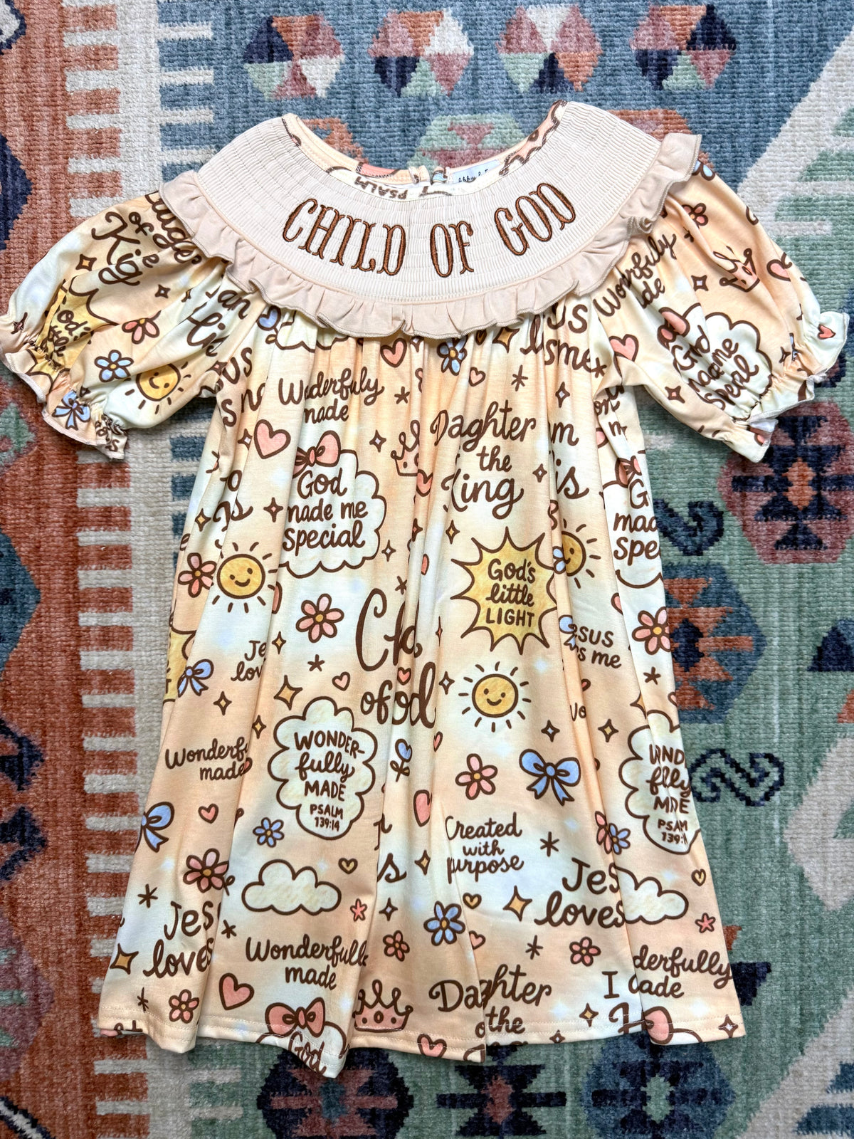 “Child of God” Smocked Ruffle Dress