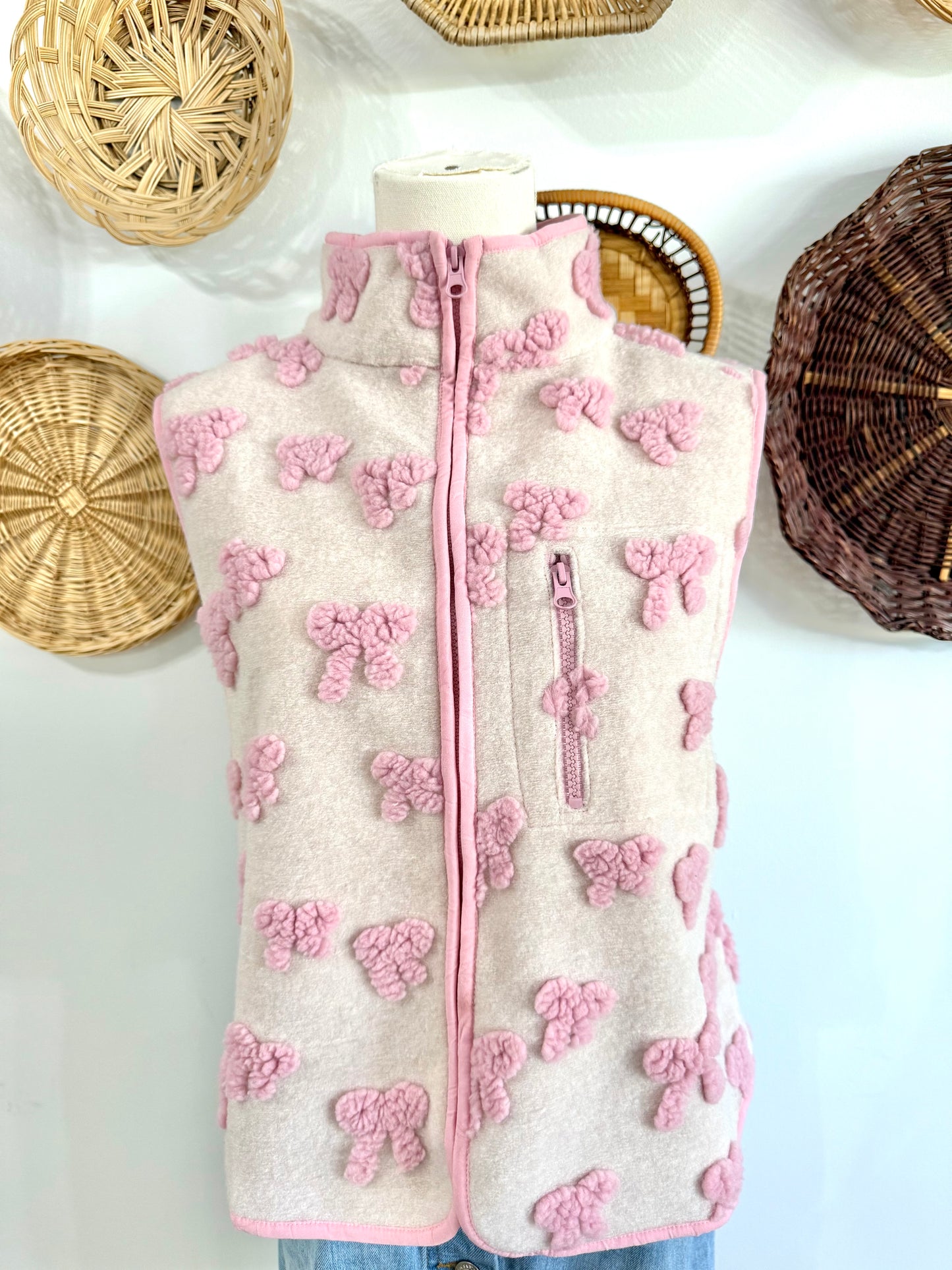 The Juniper Textured Bow Print Vest in Pink