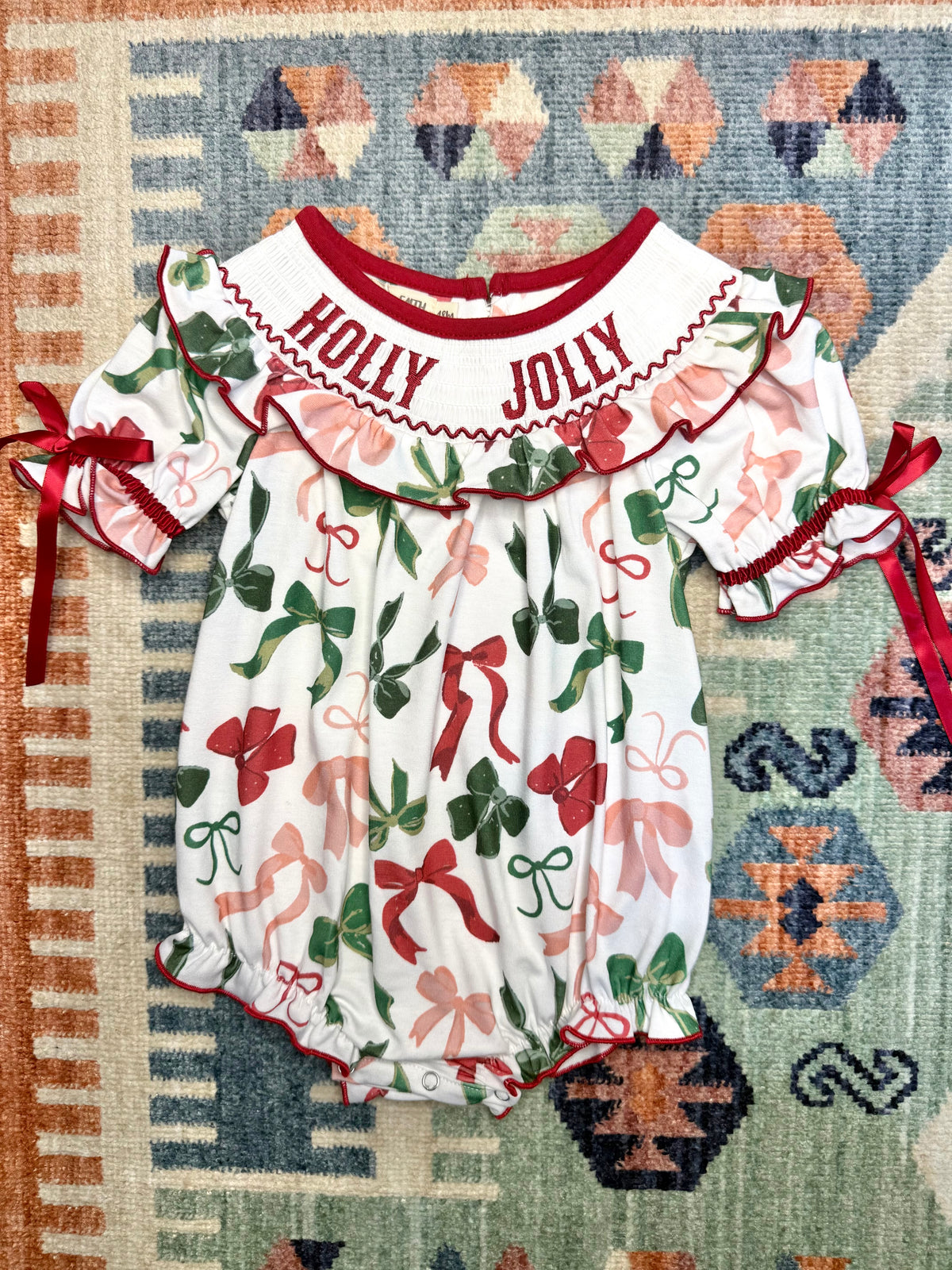 Smocked “Holly Jolly” Ruffle Bow Print Bubble