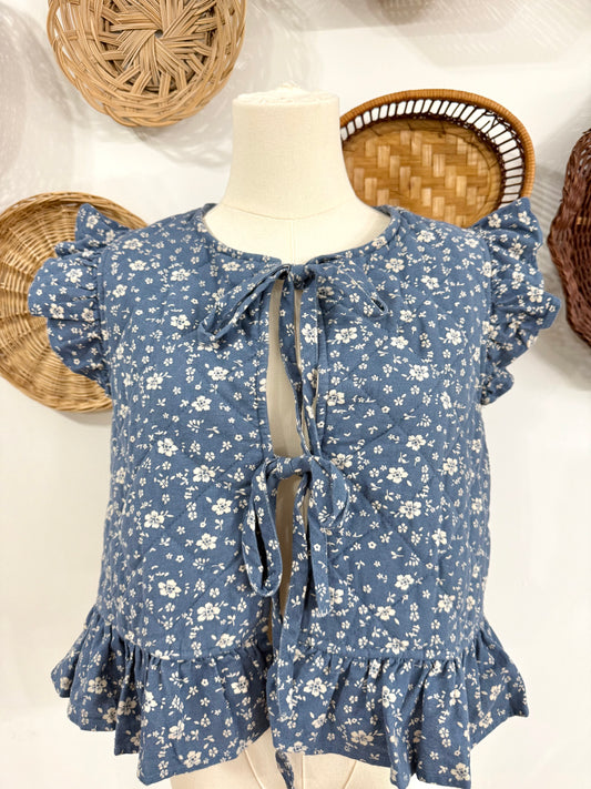 The Adora Quilted Floral Print Vest in Denim Blue