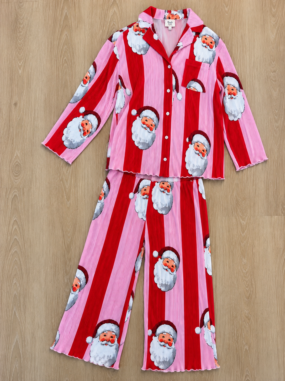 The Buddy Santa Print Striped Pajama Set in Pink & Red