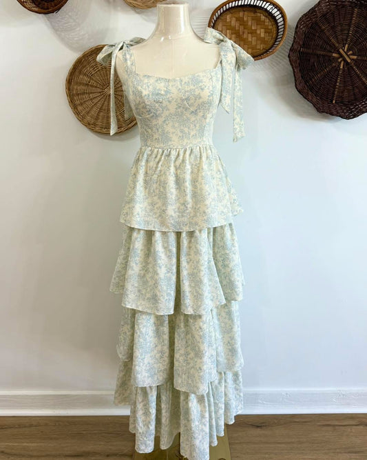 The Shae Floral Ruffle Tiered Maxi Dress in Blue & White